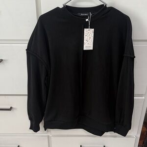 Women’s black polyester Sweater